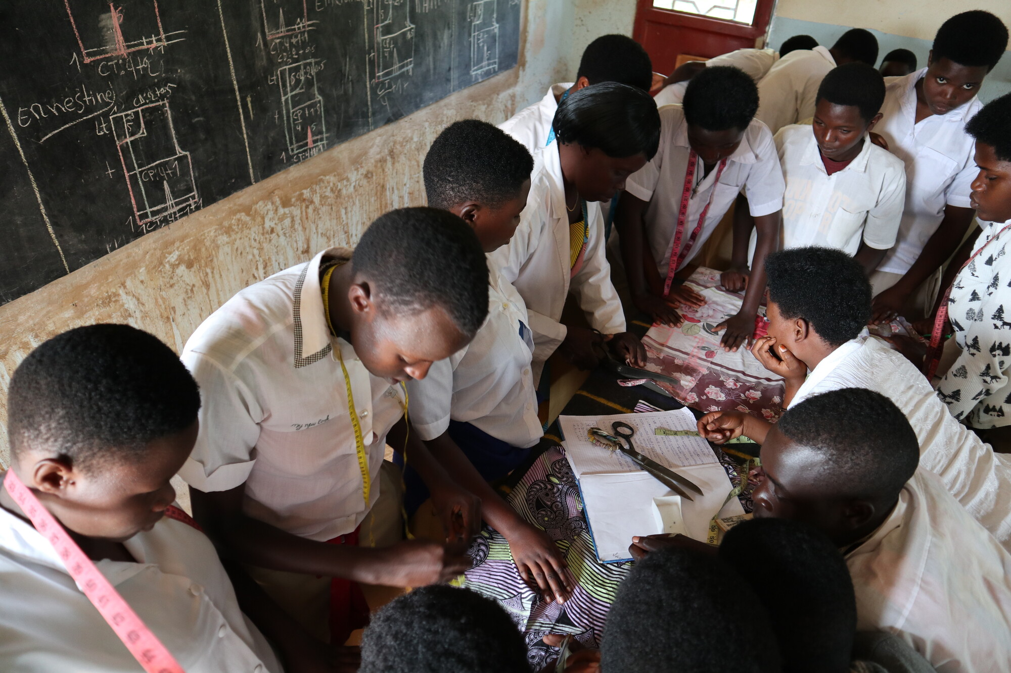 A group of students sewing